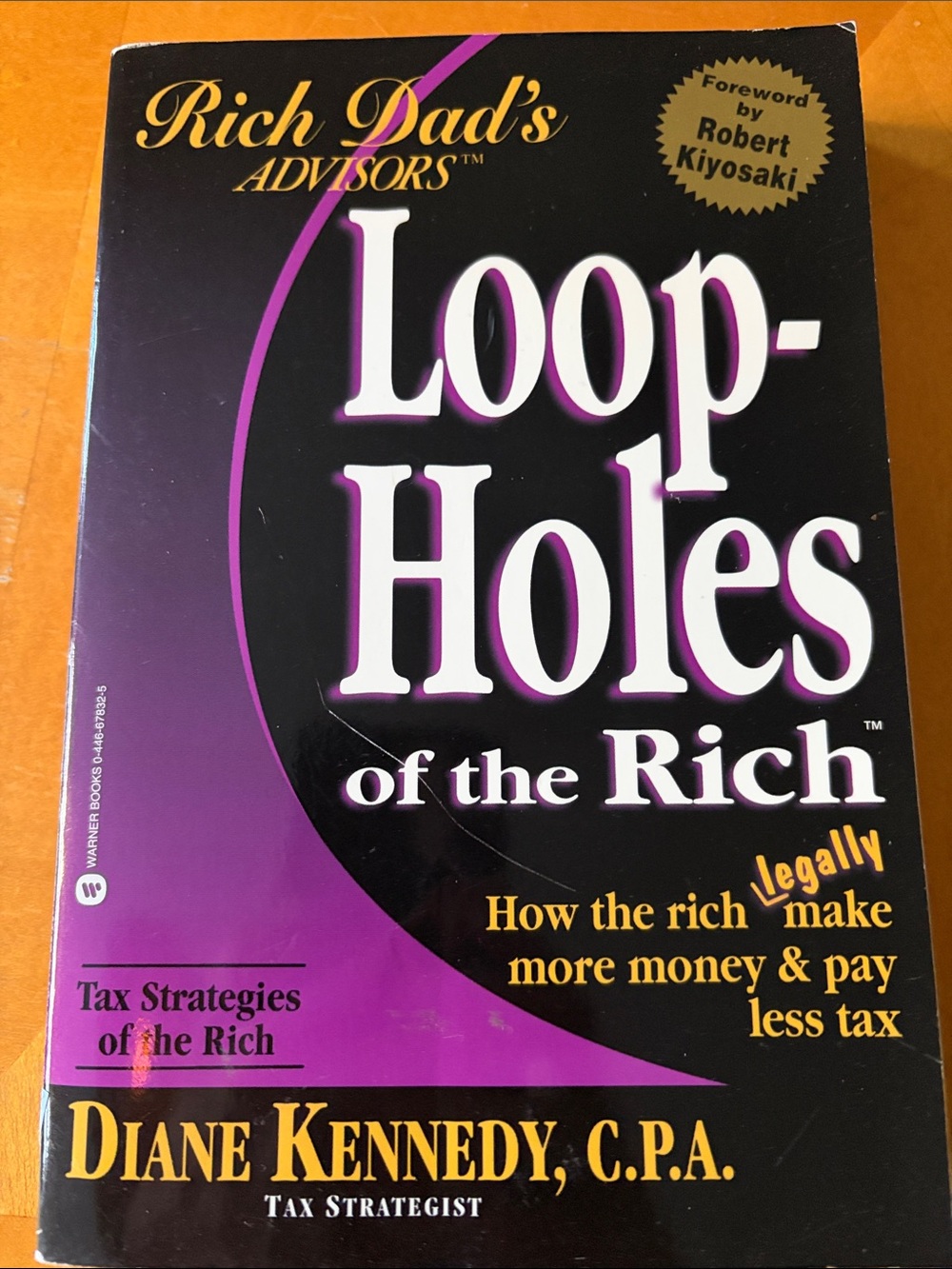 Loop-Holes of the Rich — Purple & Black Paperback by Diane Kennedy